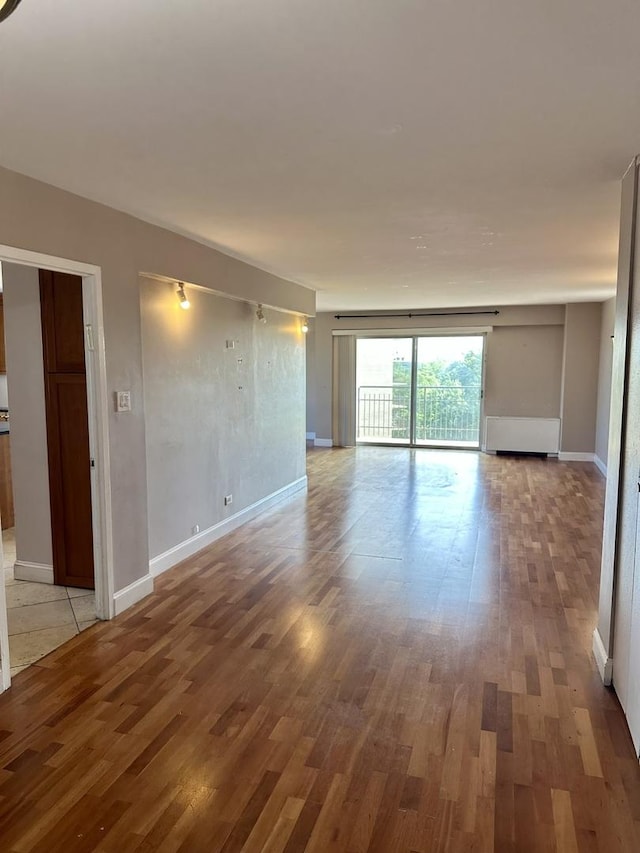 7033 N Kedzie Ave Unit 701, Chicago, IL 60645 - spare room with light wood finished floors and baseboards