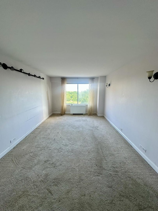 7033 N Kedzie Ave Unit 701, Chicago, IL 60645 - empty room with carpet flooring