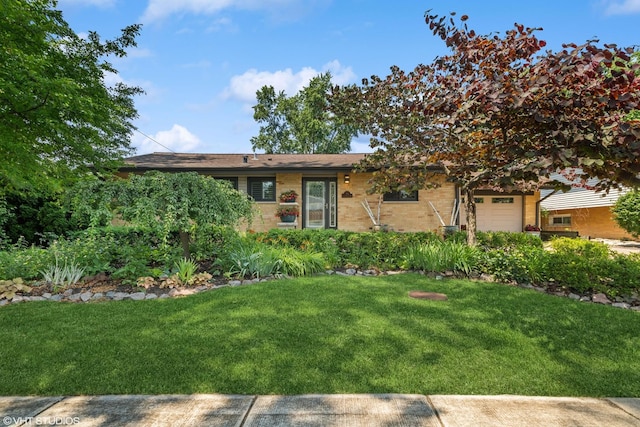 316 S Reuter Dr, Arlington Heights, IL 60005 - ranch-style home featuring a front yard, a garage, and brick siding