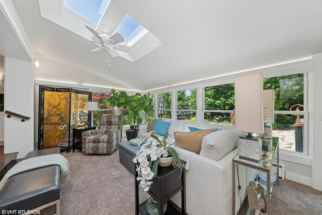 316 S Reuter Dr, Arlington Heights, IL 60005 - living room featuring a skylight, carpet, vaulted ceiling, a ceiling fan, and a baseboard heating unit