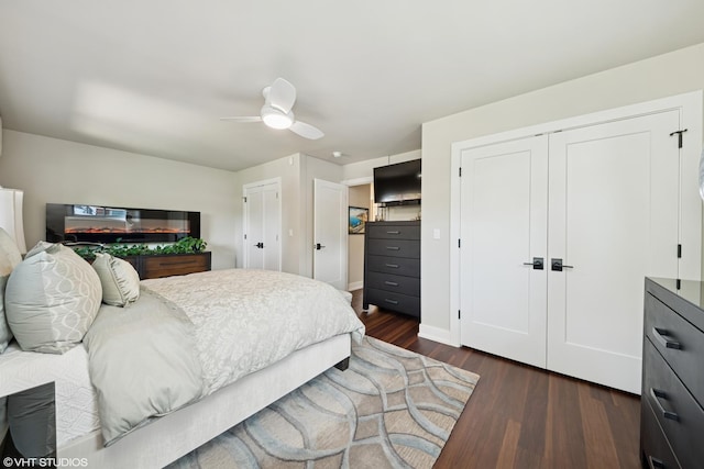 316 S Reuter Dr, Arlington Heights, IL 60005 - bedroom featuring multiple closets, dark wood-style floors, and a ceiling fan