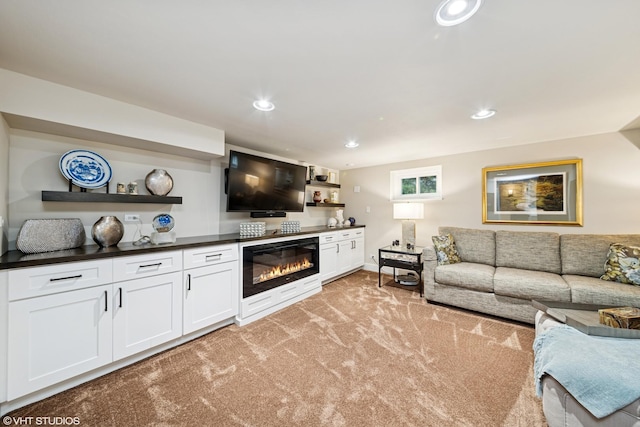 316 S Reuter Dr, Arlington Heights, IL 60005 - living area with light carpet, a glass covered fireplace, and recessed lighting