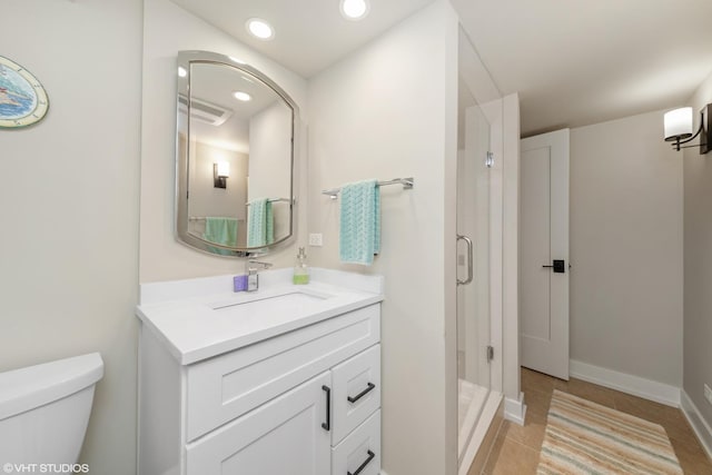 316 S Reuter Dr, Arlington Heights, IL 60005 - bathroom featuring vanity, a stall shower, tile patterned flooring, and recessed lighting