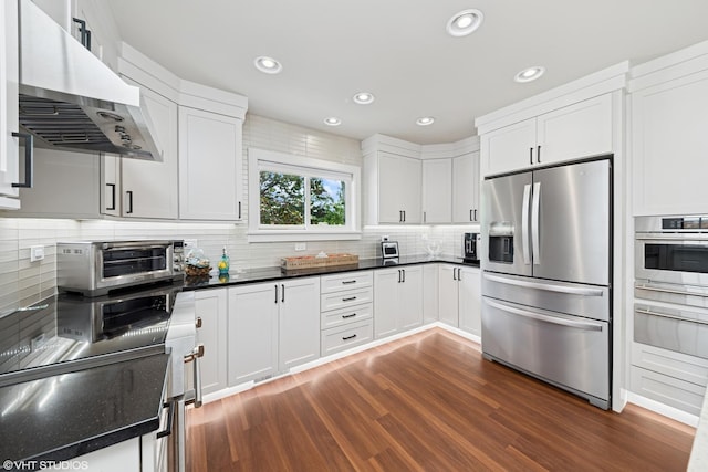 316 S Reuter Dr, Arlington Heights, IL 60005 - kitchen with stainless steel appliances, range hood, a warming drawer, dark wood-style floors, and backsplash