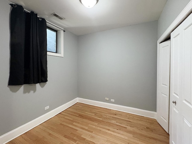 76351/2 N Greenview Ave Unit 1S, Chicago, IL 60626 - unfurnished bedroom featuring light wood-type flooring and a closet