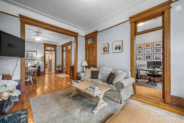 3516 N Reta Ave, Chicago, IL 60657 - living room featuring an office area, ornamental molding, wood finished floors, and a ceiling fan