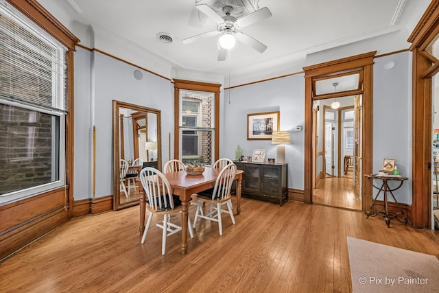 3516 N Reta Ave, Chicago, IL 60657 - dining area featuring light wood-style floors and a ceiling fan