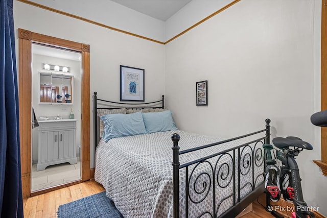 3516 N Reta Ave, Chicago, IL 60657 - bedroom with wood-type flooring and a sink