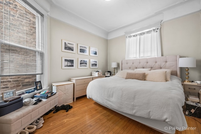 3516 N Reta Ave, Chicago, IL 60657 - bedroom with light wood finished floors and ornamental molding