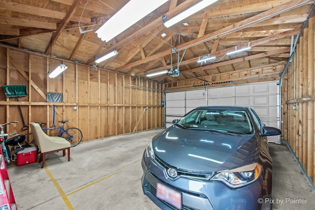 3516 N Reta Ave, Chicago, IL 60657 - garage featuring a garage door opener