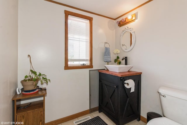 609 N 7th St, Dekalb, IL 60115 - half bathroom with vanity and crown molding