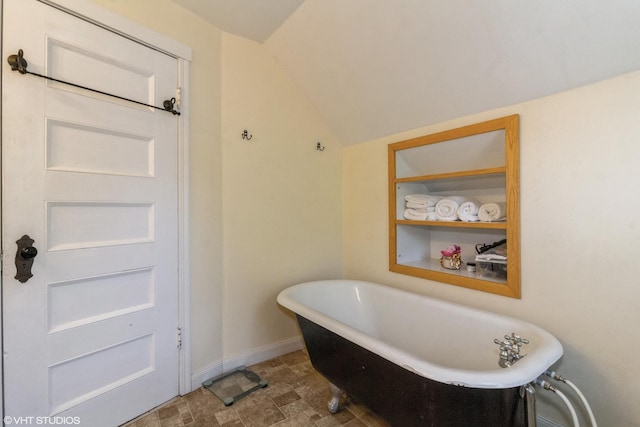 609 N 7th St, Dekalb, IL 60115 - full bathroom with a soaking tub and vaulted ceiling