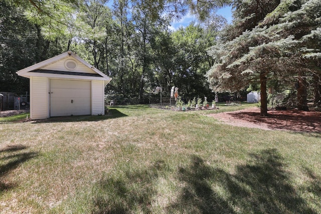 5955 E S Prairie Dr, Morris, IL 60450 - view of grassy yard with a storage unit and a garage