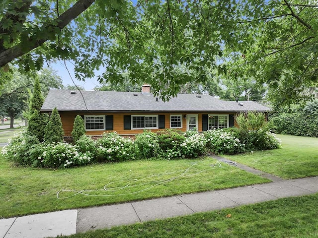 1207 W Busse Ave, Mount Prospect, IL 60056 - single story home featuring a front lawn and a chimney