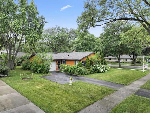 1207 W Busse Ave, Mount Prospect, IL 60056 - single story home featuring a garage, a front lawn, asphalt driveway, and a chimney