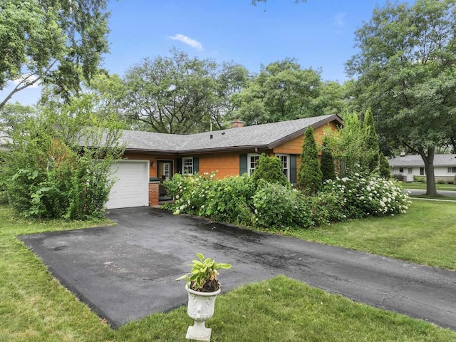 1207 W Busse Ave, Mount Prospect, IL 60056 - ranch-style home featuring an attached garage, asphalt driveway, a chimney, a front yard, and brick siding