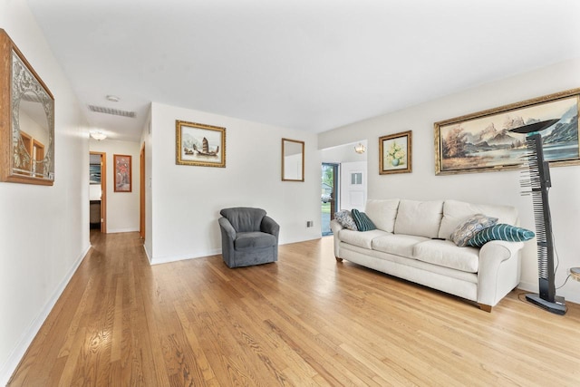 1207 W Busse Ave, Mount Prospect, IL 60056 - living room with light wood-type flooring and baseboards