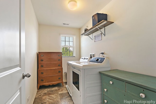 218 Minuet Cir, Volo, IL 60073 - laundry area with independent washer and dryer and stone finish floors