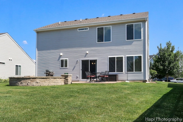 218 Minuet Cir, Volo, IL 60073 - back of house featuring a yard and a patio area