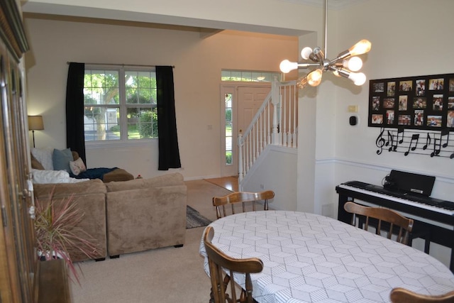 4355 Barharbor Dr, Lake In The Hills, IL 60156 - dining space with a chandelier, carpet flooring, plenty of natural light, and stairs