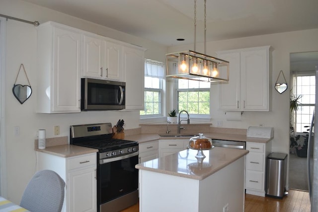 4355 Barharbor Dr, Lake In The Hills, IL 60156 - kitchen with appliances with stainless steel finishes, healthy amount of natural light, white cabinets, and light countertops