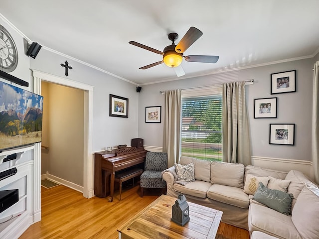 307 Christie St, Ottawa, IL 61350 - living area featuring a ceiling fan, light wood-style flooring, and ornamental molding