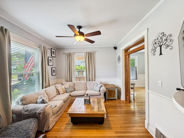 307 Christie St, Ottawa, IL 61350 - living area with a ceiling fan, light wood-type flooring, and ornamental molding