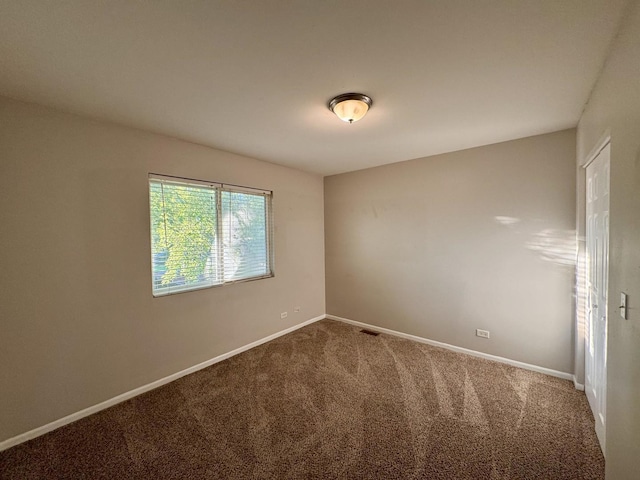 17303 Kedzie Ave, Hazel Crest, IL 60429 - carpeted empty room featuring baseboards