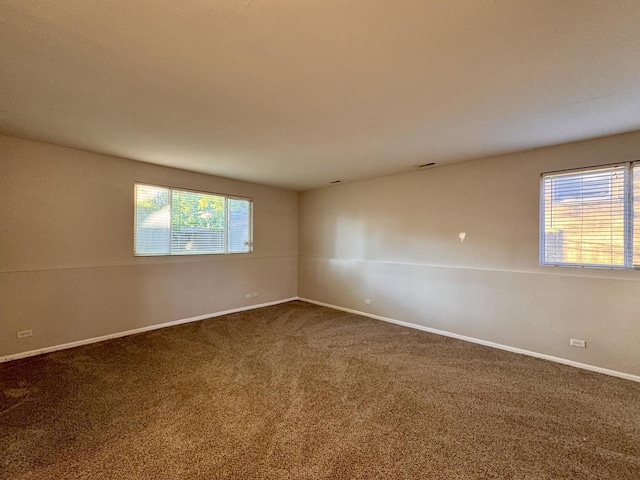 17303 Kedzie Ave, Hazel Crest, IL 60429 - unfurnished room featuring plenty of natural light and dark carpet