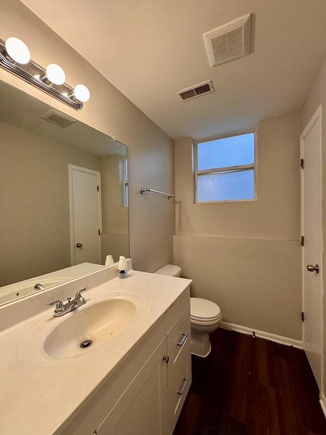 17303 Kedzie Ave, Hazel Crest, IL 60429 - bathroom featuring vanity and wood finished floors