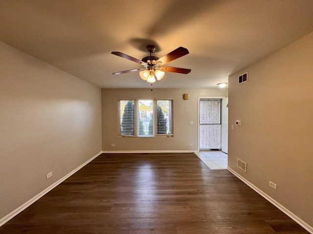 17303 Kedzie Ave, Hazel Crest, IL 60429 - empty room with a ceiling fan and dark wood-style floors
