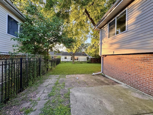 17303 Kedzie Ave, Hazel Crest, IL 60429 - fenced backyard with a patio area