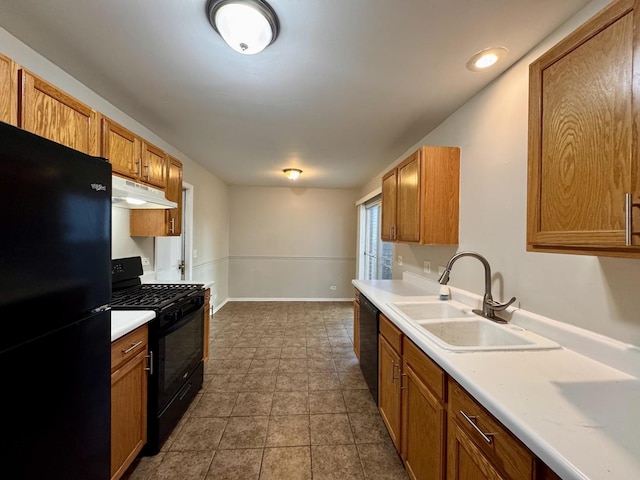 17303 Kedzie Ave, Hazel Crest, IL 60429 - kitchen featuring black appliances, under cabinet range hood, light countertops, and brown cabinetry