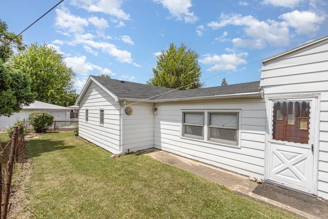 1723 N Raynor Ave, Crest Hill, IL 60403 - view of home's exterior featuring roof with shingles