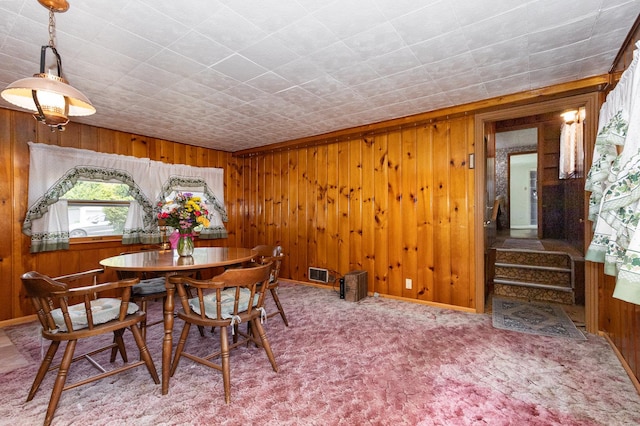 1723 N Raynor Ave, Crest Hill, IL 60403 - dining space with wood walls, stairs, and carpet