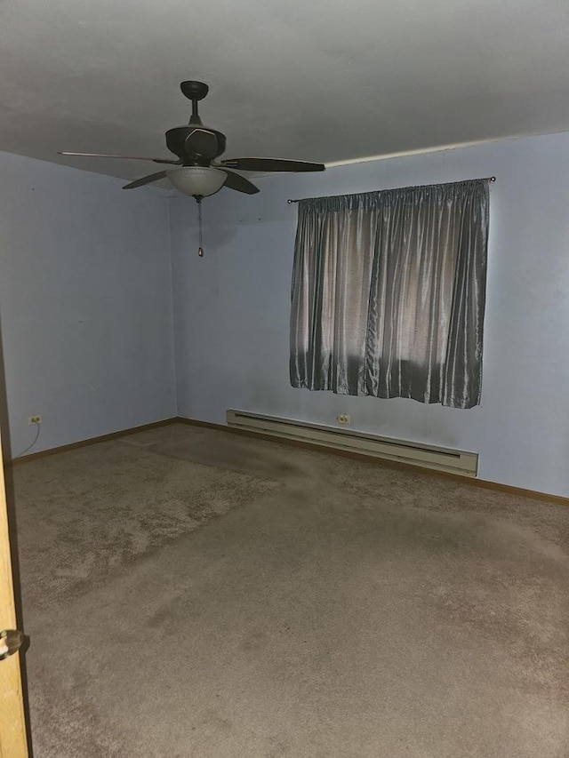 14536 S Muskegon Ave Unit 3B, Burnham, IL 60633 - empty room featuring a baseboard radiator and ceiling fan