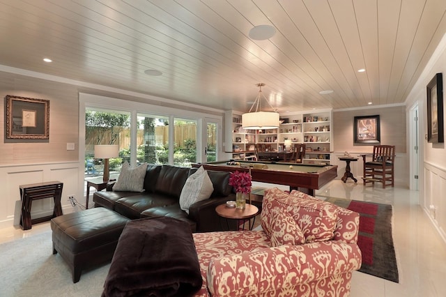 100 Beach Rd, Glencoe, IL 60022 - living room featuring recessed lighting, wainscoting, crown molding, a decorative wall, and a fireplace