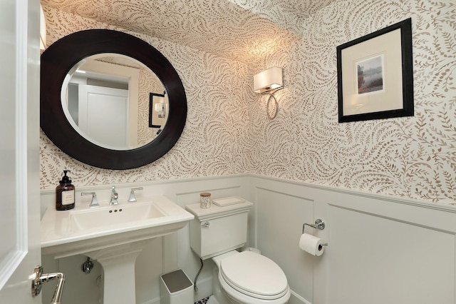100 Beach Rd, Glencoe, IL 60022 - bathroom with wallpapered walls and wainscoting