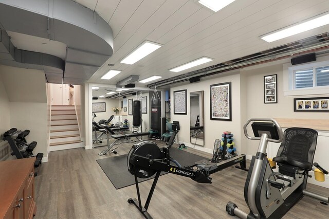 100 Beach Rd, Glencoe, IL 60022 - exercise room featuring wood finished floors and baseboards