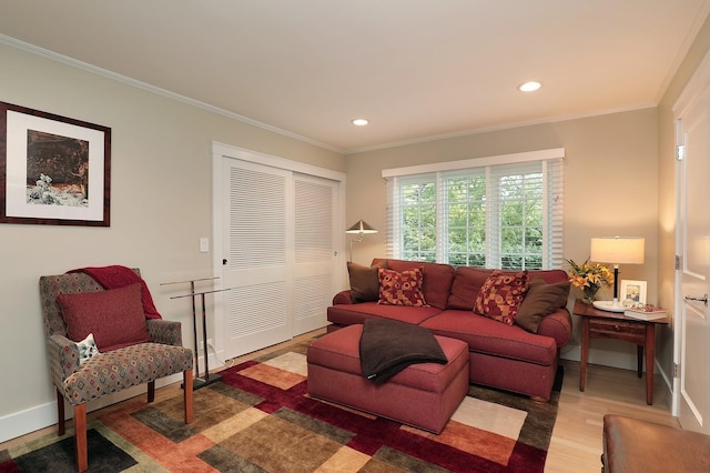 100 Beach Rd, Glencoe, IL 60022 - living area with ornamental molding, wood finished floors, and recessed lighting