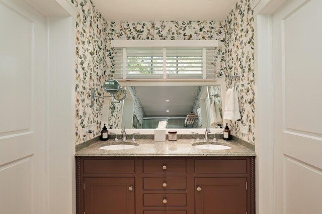 100 Beach Rd, Glencoe, IL 60022 - bathroom with wallpapered walls and double vanity