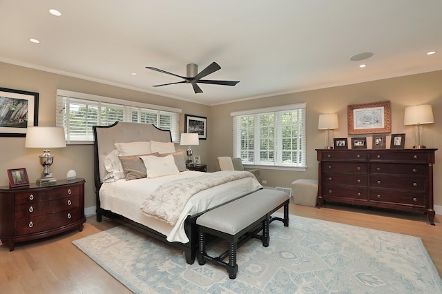 100 Beach Rd, Glencoe, IL 60022 - bedroom featuring multiple windows, light wood finished floors, ornamental molding, ceiling fan, and recessed lighting