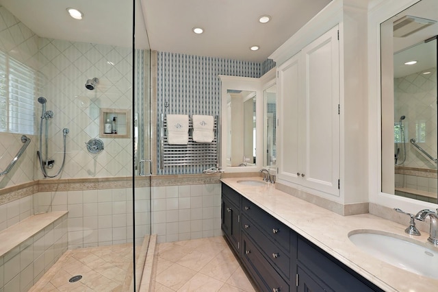 100 Beach Rd, Glencoe, IL 60022 - full bath featuring a shower stall, double vanity, recessed lighting, tile patterned flooring, and healthy amount of natural light