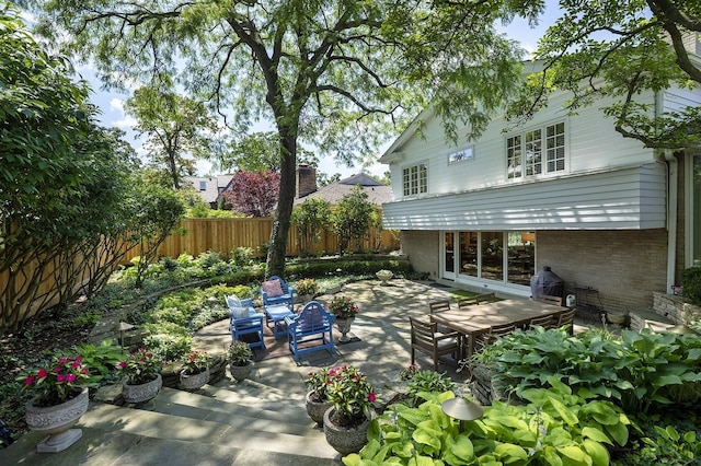 100 Beach Rd, Glencoe, IL 60022 - fenced backyard featuring a patio area