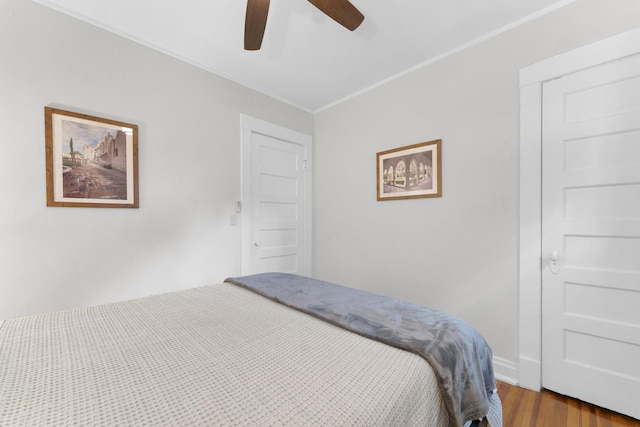 317 N Marion St, Oak Park, IL 60302 - bedroom featuring wood finished floors, ornamental molding, and ceiling fan