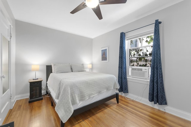 317 N Marion St, Oak Park, IL 60302 - bedroom with cooling unit, light wood-type flooring, and a ceiling fan
