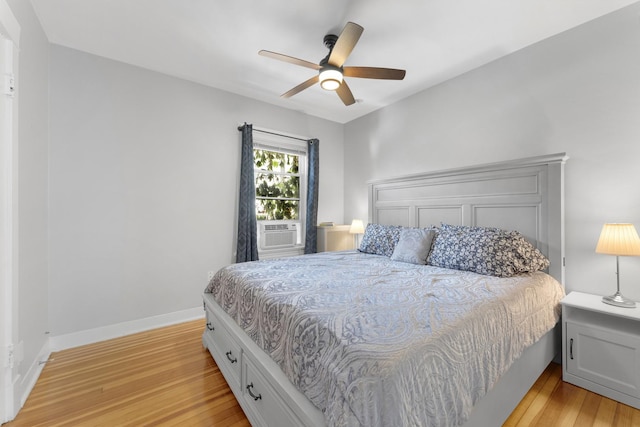 317 N Marion St, Oak Park, IL 60302 - bedroom featuring light wood finished floors, cooling unit, and a ceiling fan