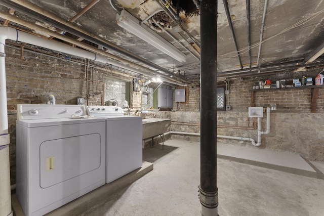 317 N Marion St, Oak Park, IL 60302 - below grade area featuring washer and clothes dryer and electric panel