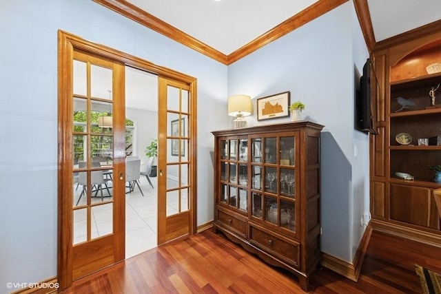 3967 Garden Ave, Western Springs, IL 60558 - entryway featuring french doors, wood finished floors, and crown molding