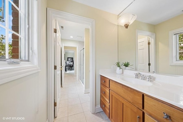 3967 Garden Ave, Western Springs, IL 60558 - bathroom featuring vanity, tile patterned flooring, and a stall shower